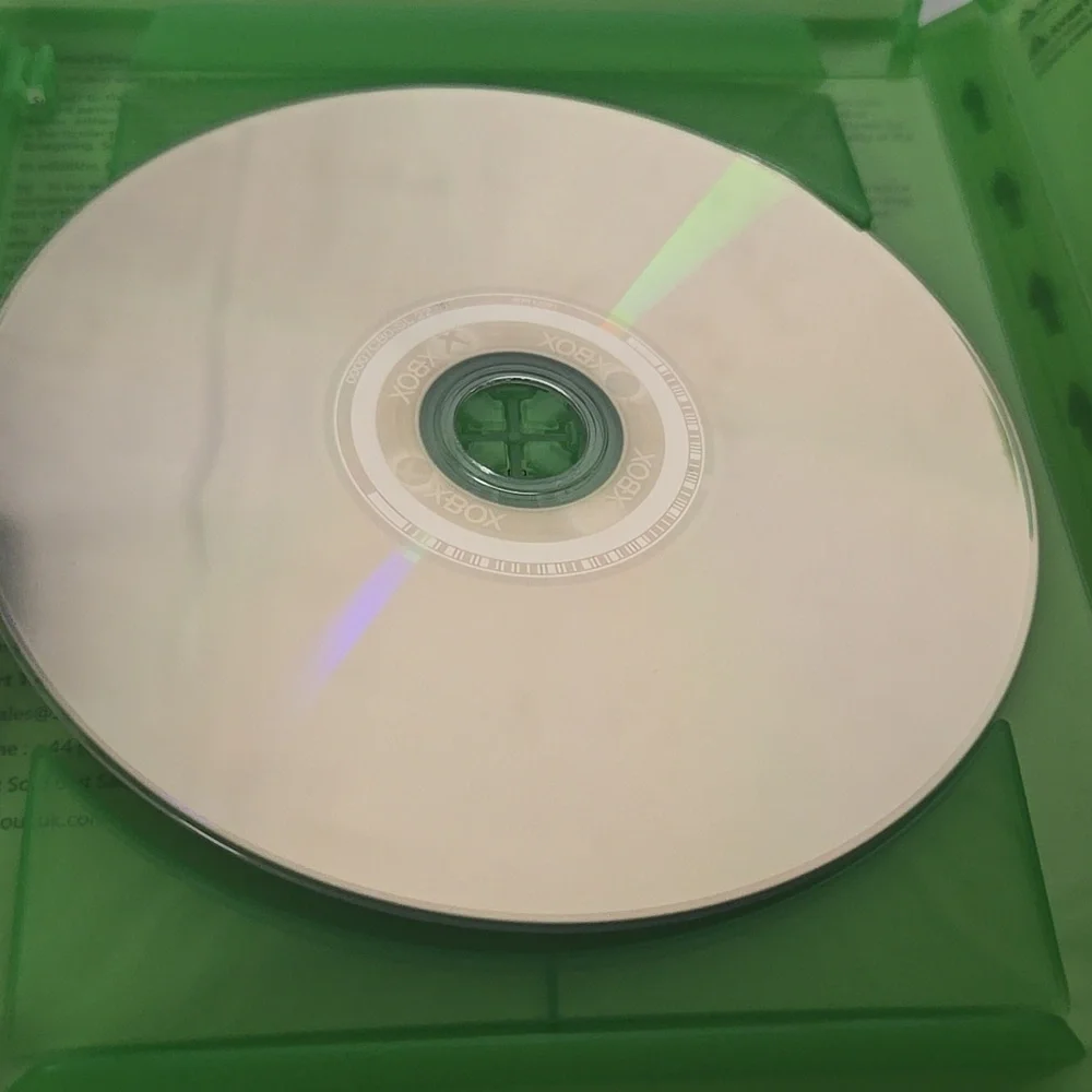 Microsoft Xbox One Game with Green Case